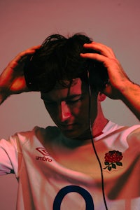 a man with headphones on is listening to music